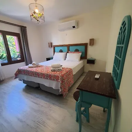 Quarto em Acomodações Particulares Sigacik Kakule Ve Cafe